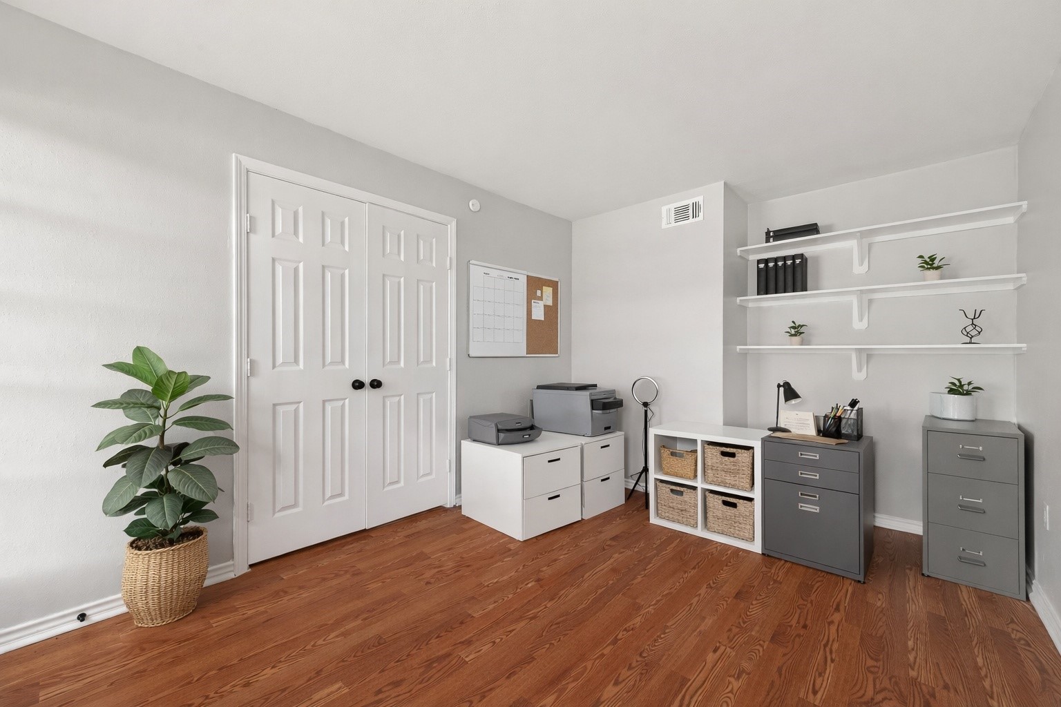 21710 Rotherham Drive Spring, TX 77388 - Photo 20 of 49 a room with furniture and wooden floor