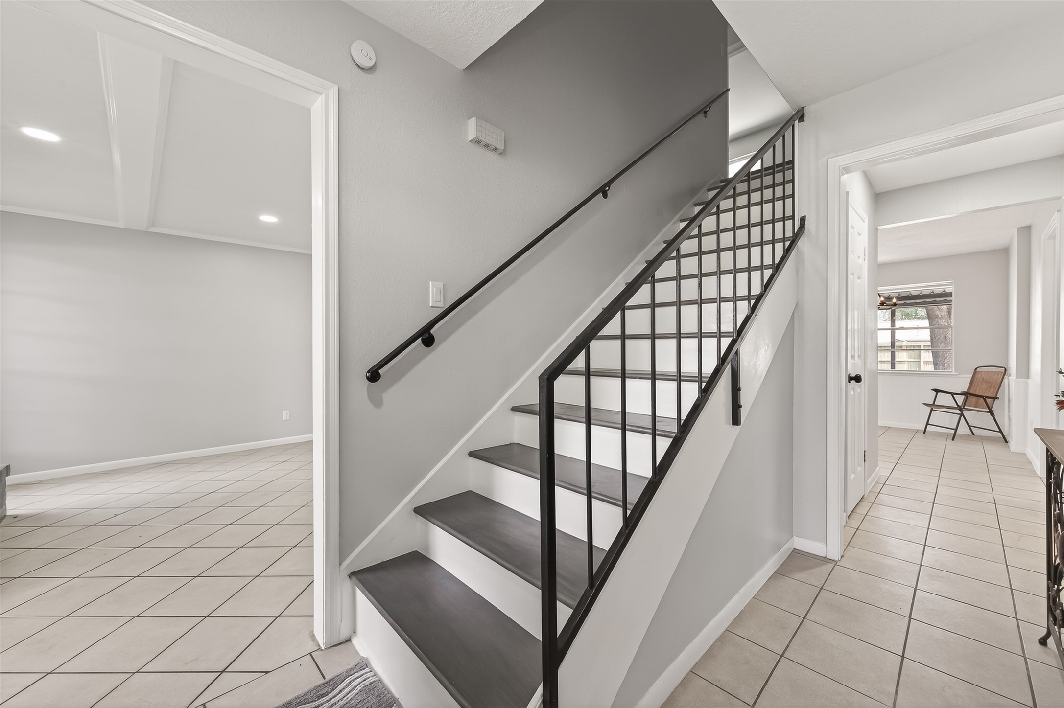 21710 Rotherham Drive Spring, TX 77388 - Photo 26 of 49 a view of staircase with white walls and railing