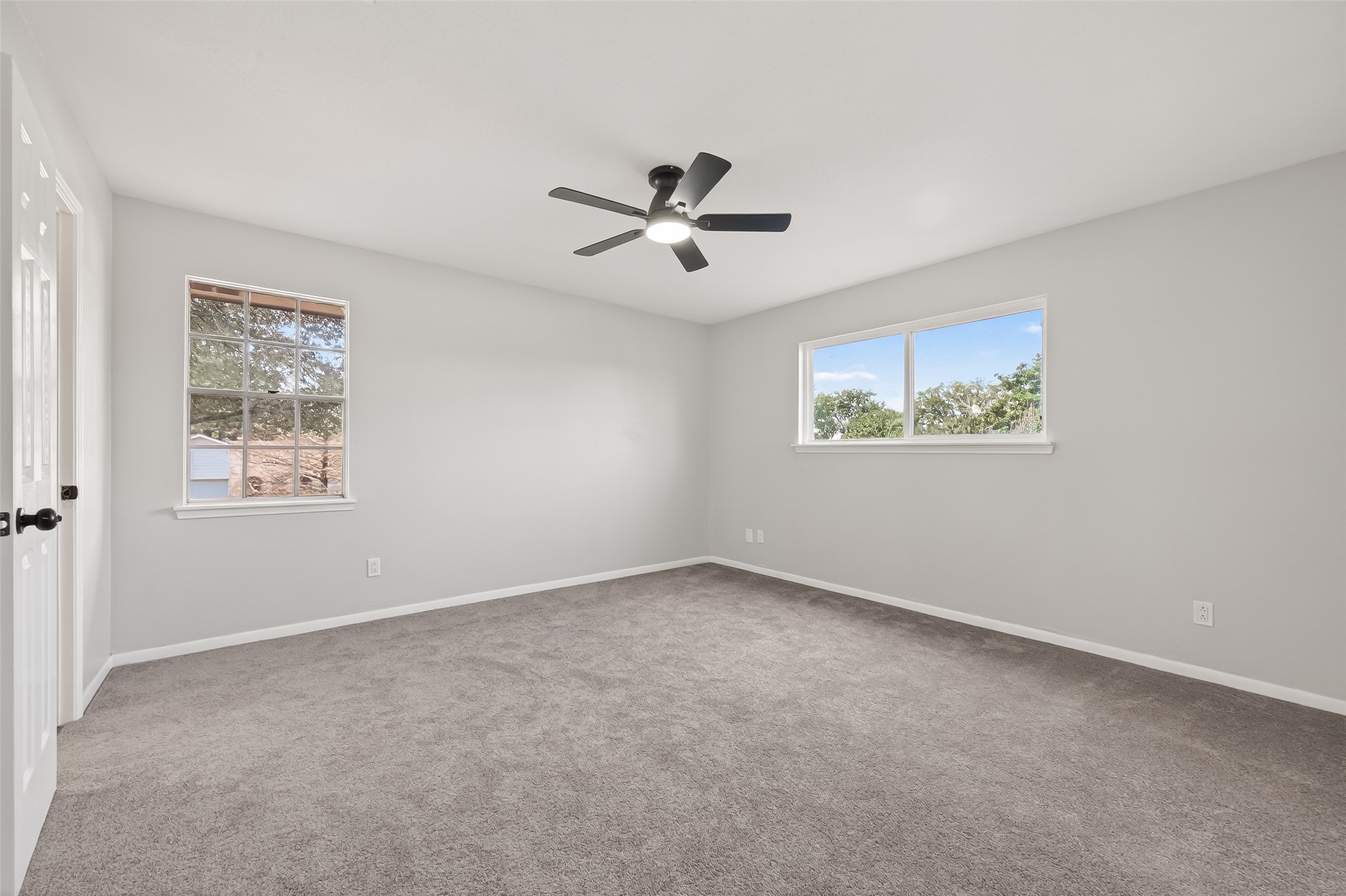21710 Rotherham Drive Spring, TX 77388 - Photo 29 of 49 a view of an empty room with a window