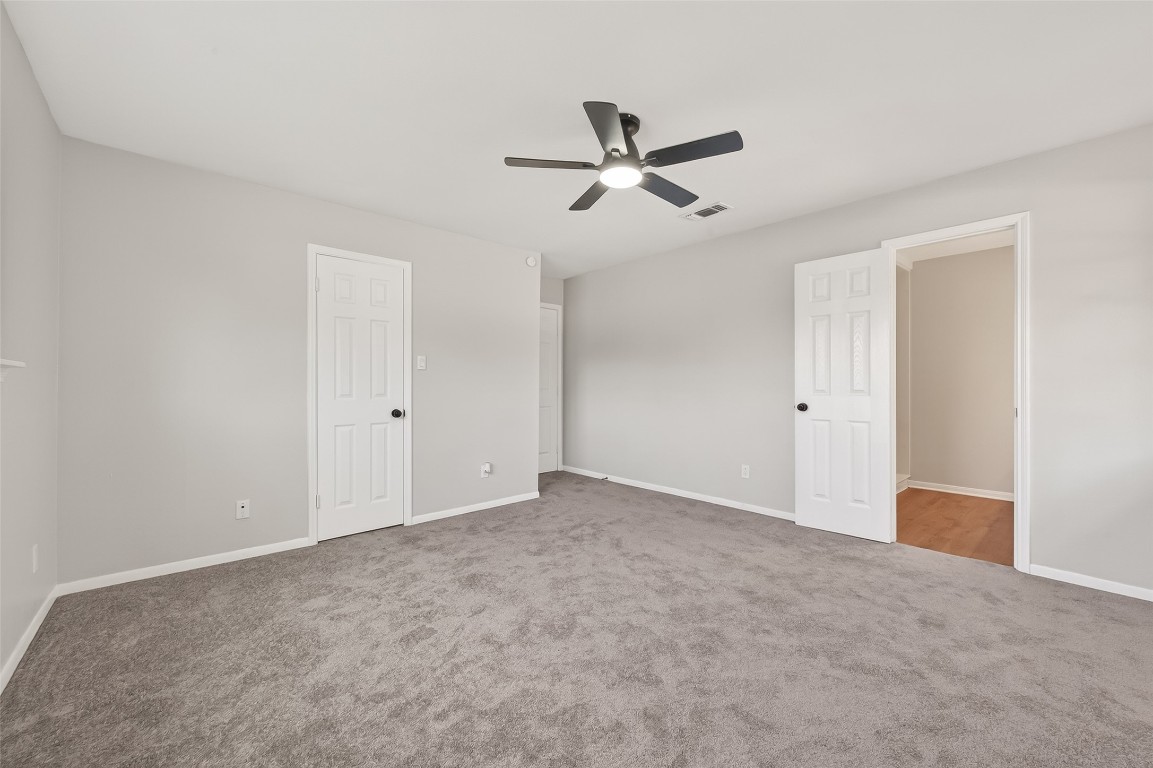 21710 Rotherham Drive Spring, TX 77388 - Photo 31 of 49 Final view of the primary bedroom emphasizing size, comfort, and versatility.