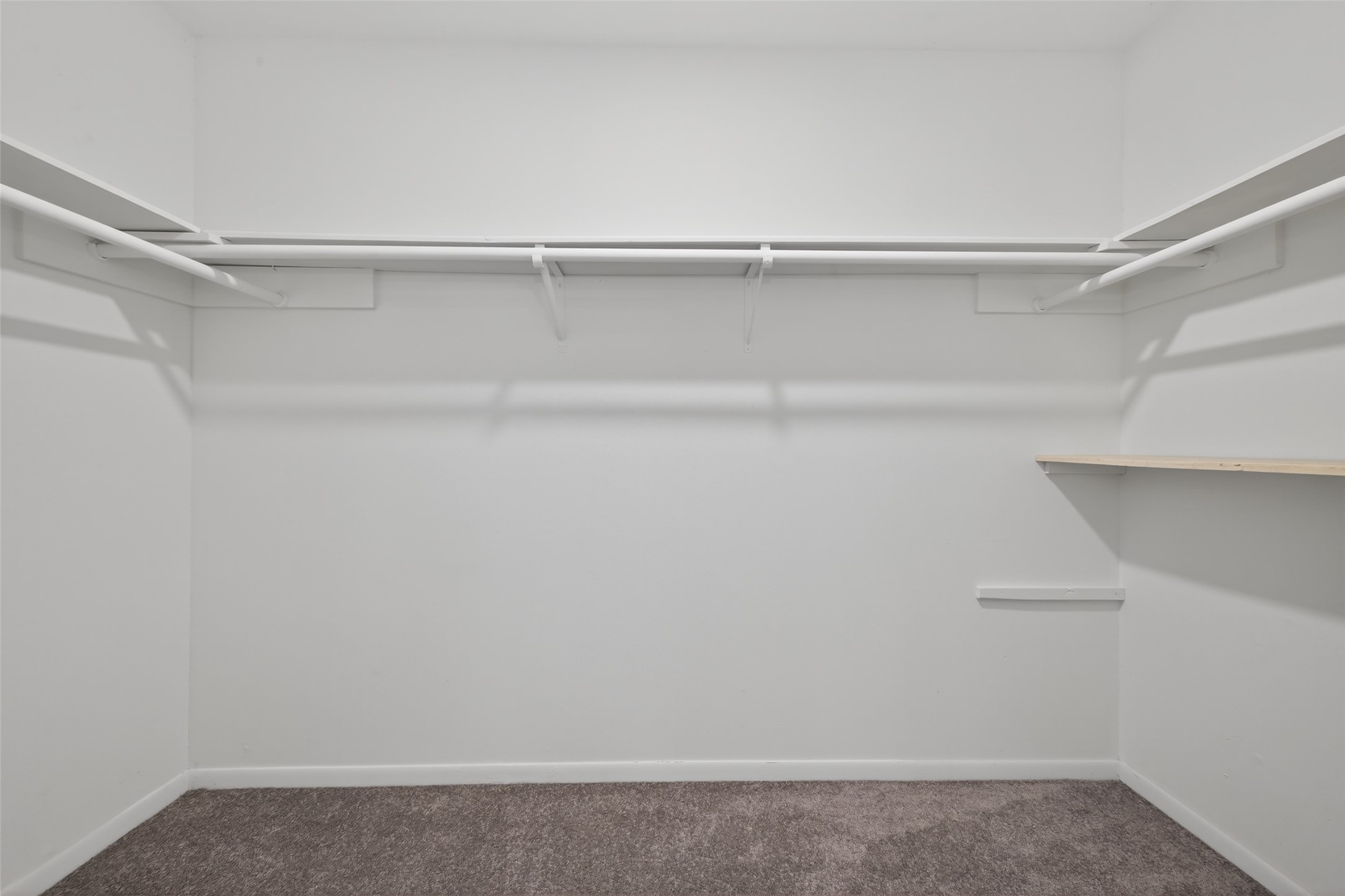 21710 Rotherham Drive Spring, TX 77388 - Photo 34 of 49 a view of an empty walk in closet
