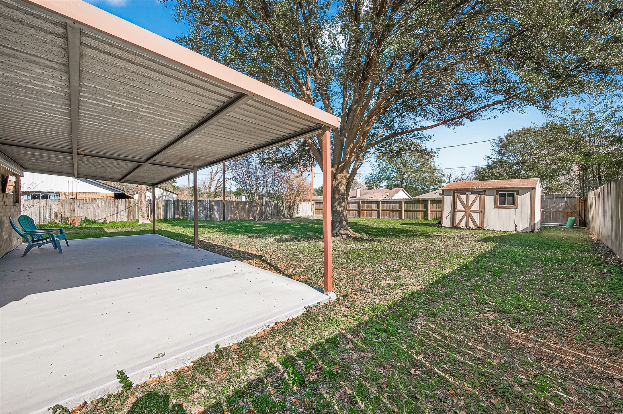 21710 Rotherham Drive Spring, TX 77388 - Photo 42 of 49 a view of a house with backyard and a tree