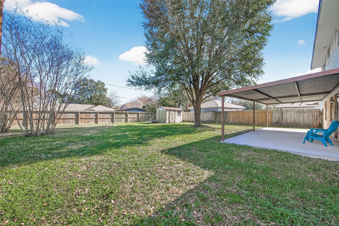 21710 Rotherham Drive Spring, TX 77388 - Photo 45 of 49 Side yard view with additional green space and privacy.