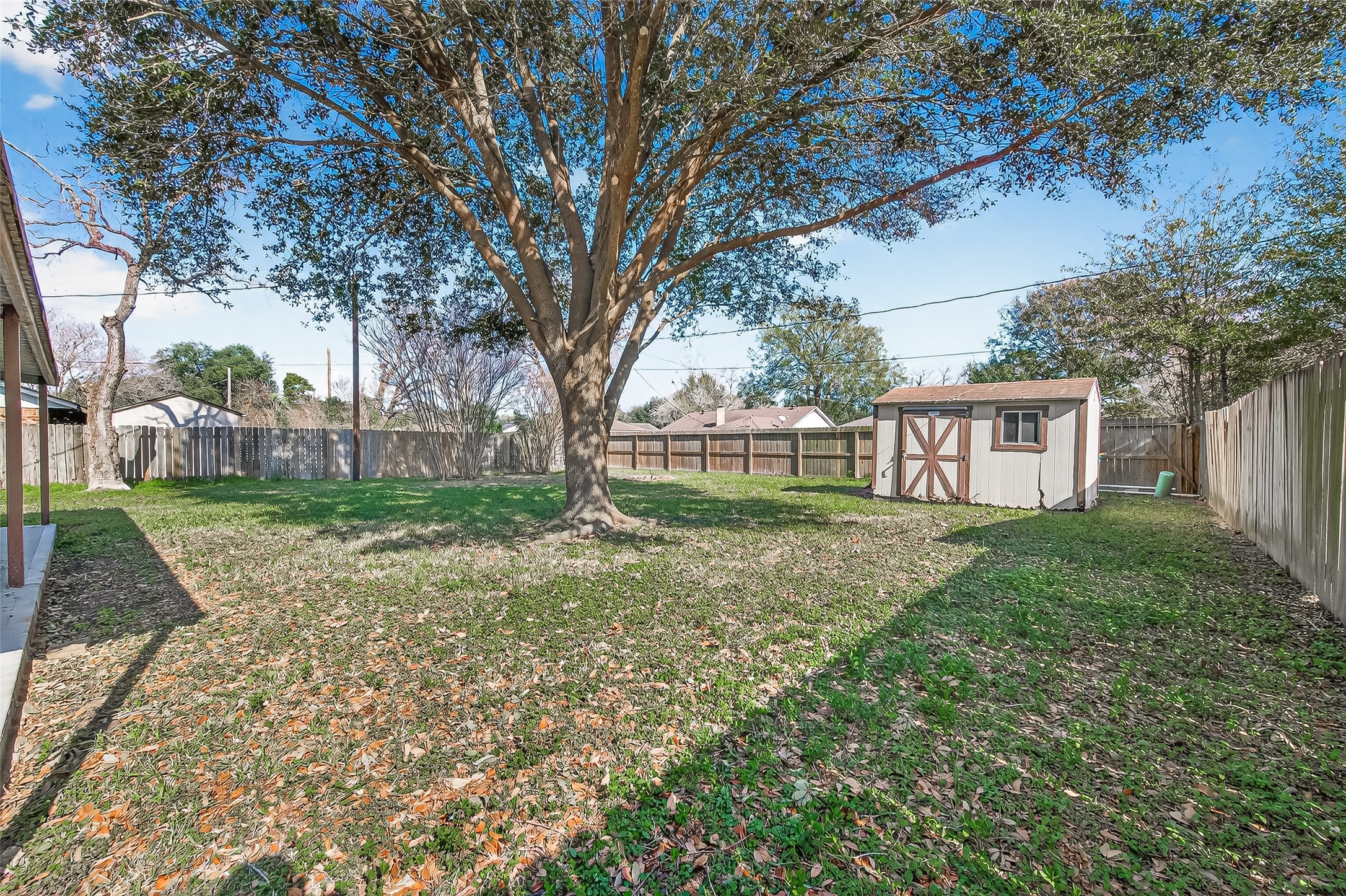 21710 Rotherham Drive Spring, TX 77388 - Photo 46 of 49 a view of a house with yard and a tree