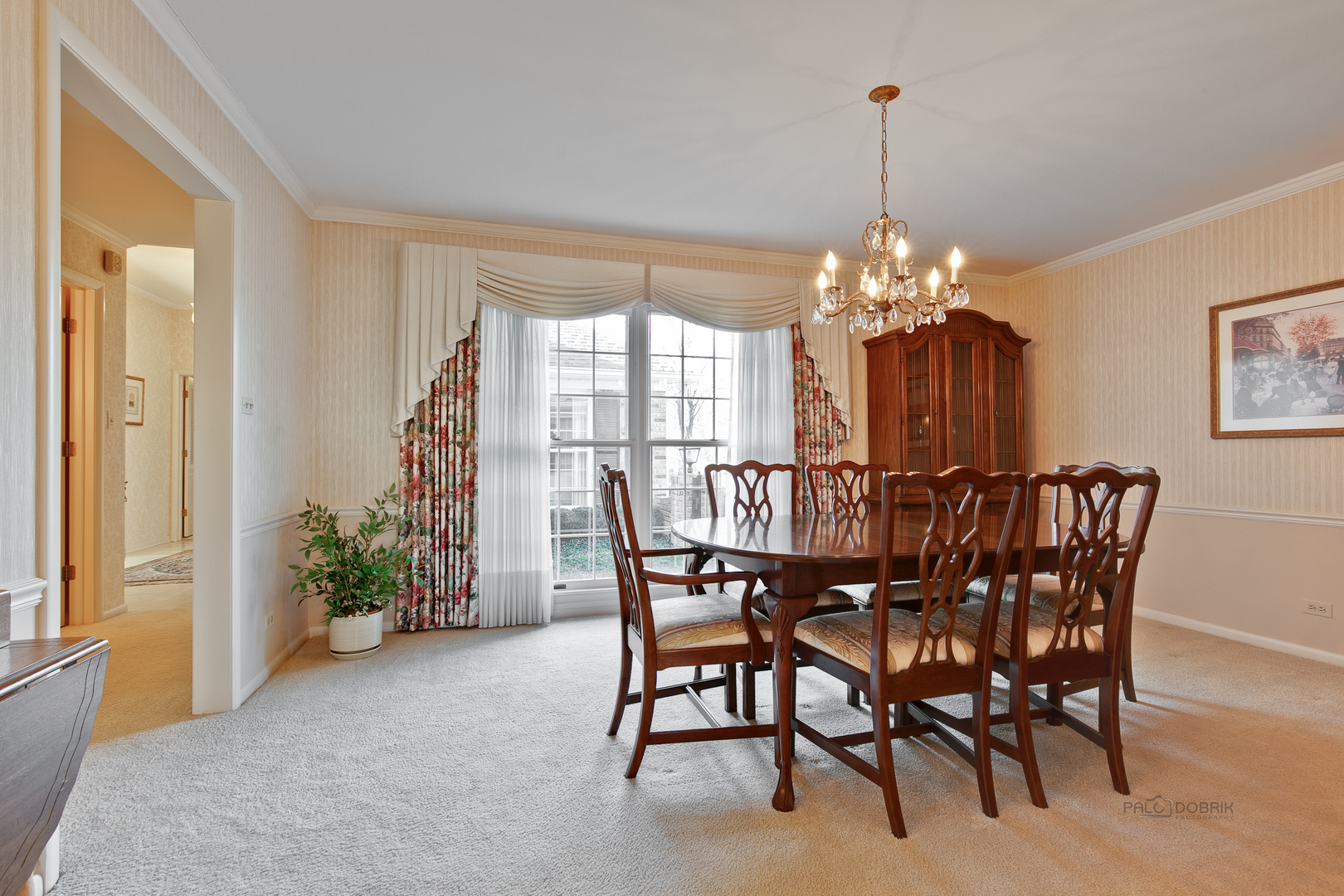 1207 Inverlieth Road Lake Forest, IL 60045 - Photo 14 of 37 a dining room with furniture a chandelier and a rug