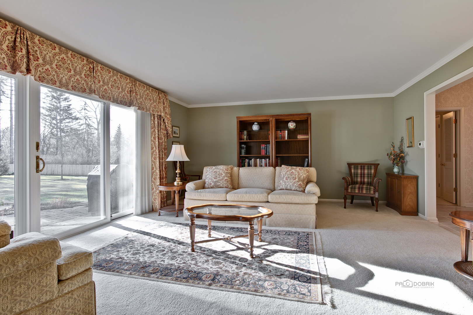 1207 Inverlieth Road Lake Forest, IL 60045 - Photo 7 of 37 a living room with furniture and a large window