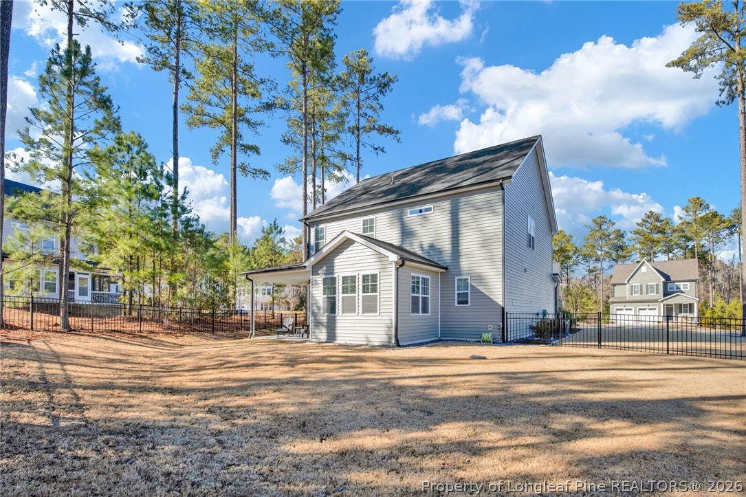 224 Timber Skip Drive Spring Lake, NC 28390 - Photo 30 of 30 a front view of a house with a garden