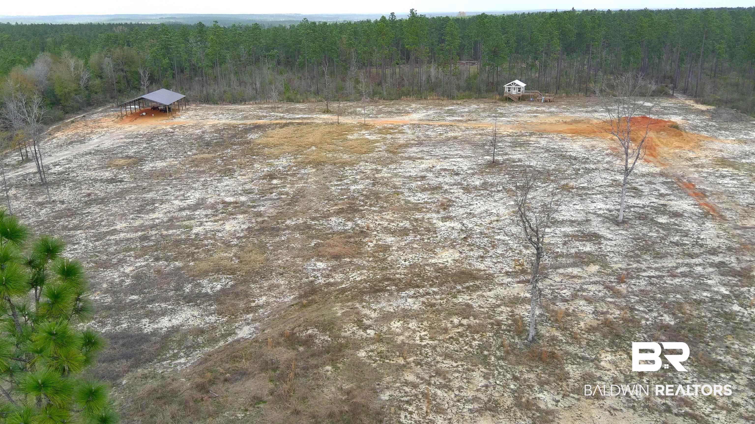 0 Paul Road Bay Minette, AL 36507 - Photo 5 of 19 Looking North towards treeline. View of Pole Barn and Treehouse