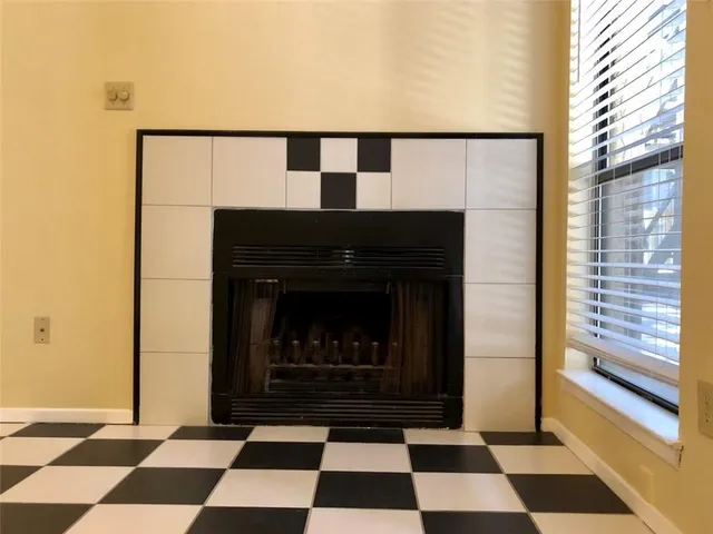 a black and white checkered floor with a black white checkered floor