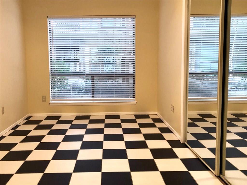 806 West 24th Street, Unit 107 Austin, TX 78705 - Photo 4 of 7 a black and white checkered floor