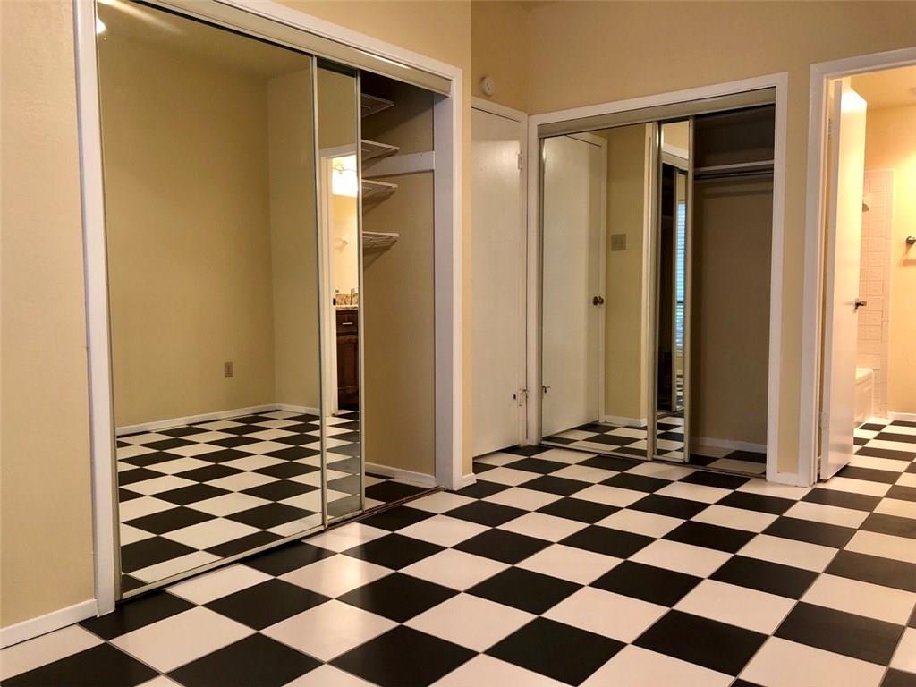806 West 24th Street, Unit 107 Austin, TX 78705 - Photo 5 of 7 a view of a refrigerator a window and checkered floor