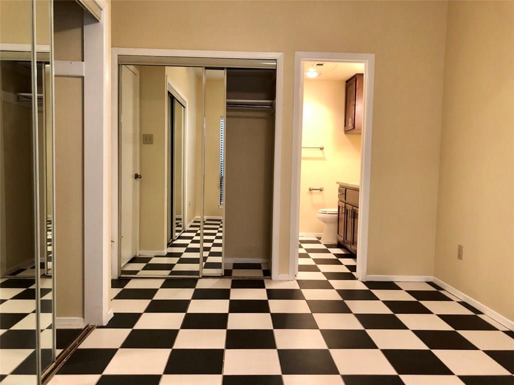 806 West 24th Street, Unit 107 Austin, TX 78705 - Photo 6 of 7 a black and white checkered floor