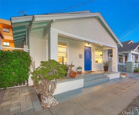 a front view of a house with a garage