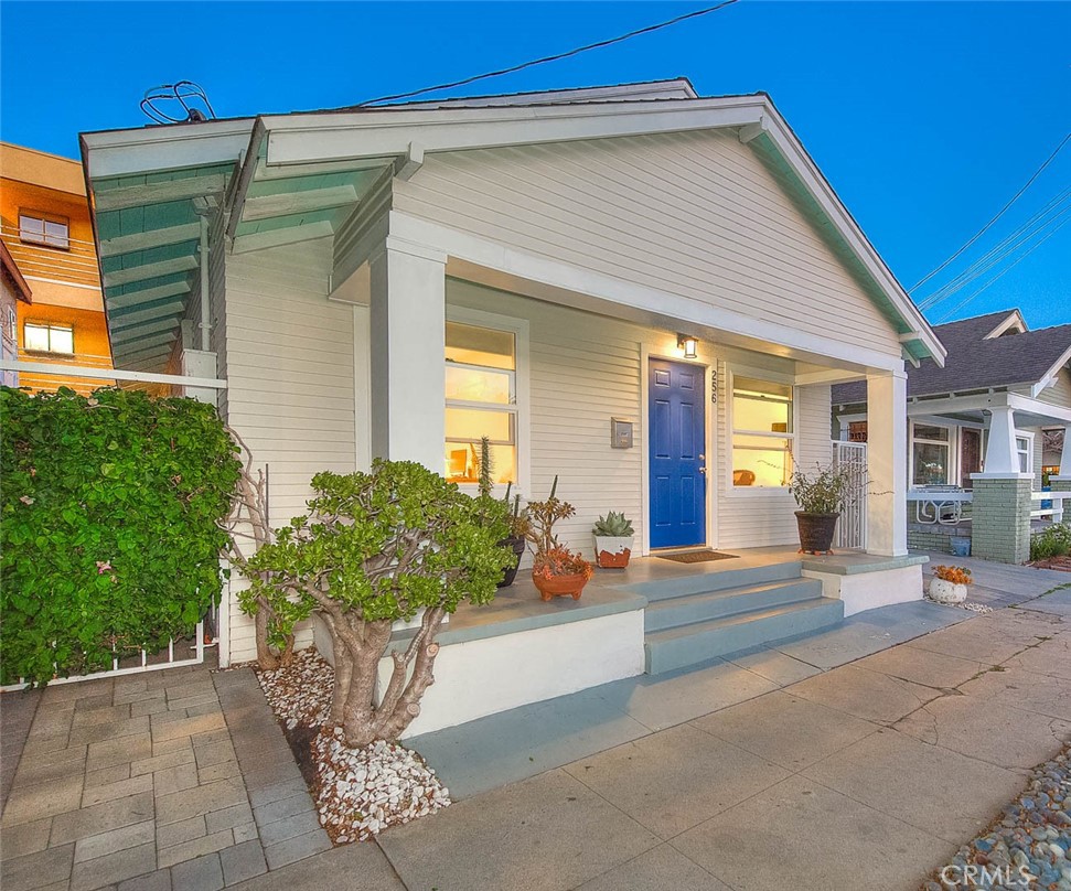 256 Falcon Avenue Long Beach, CA 90802 - Photo 2 of 42 a front view of a house with a garage