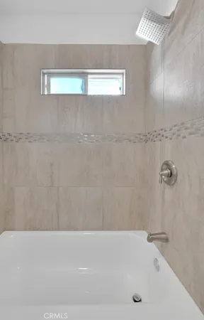 a bathroom with a bathtub