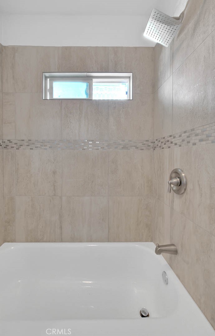256 Falcon Avenue Long Beach, CA 90802 - Photo 22 of 42 a bathroom with a bathtub