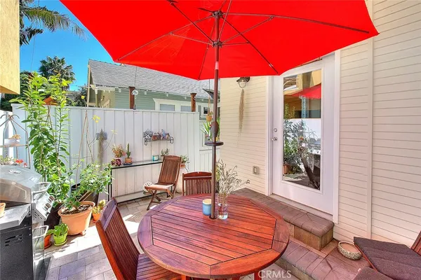 a view of a tables and chairs in patio
