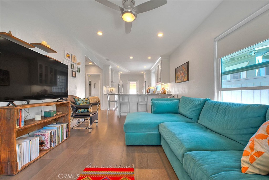 256 Falcon Avenue Long Beach, CA 90802 - Photo 9 of 42 a living room with furniture and a flat screen tv