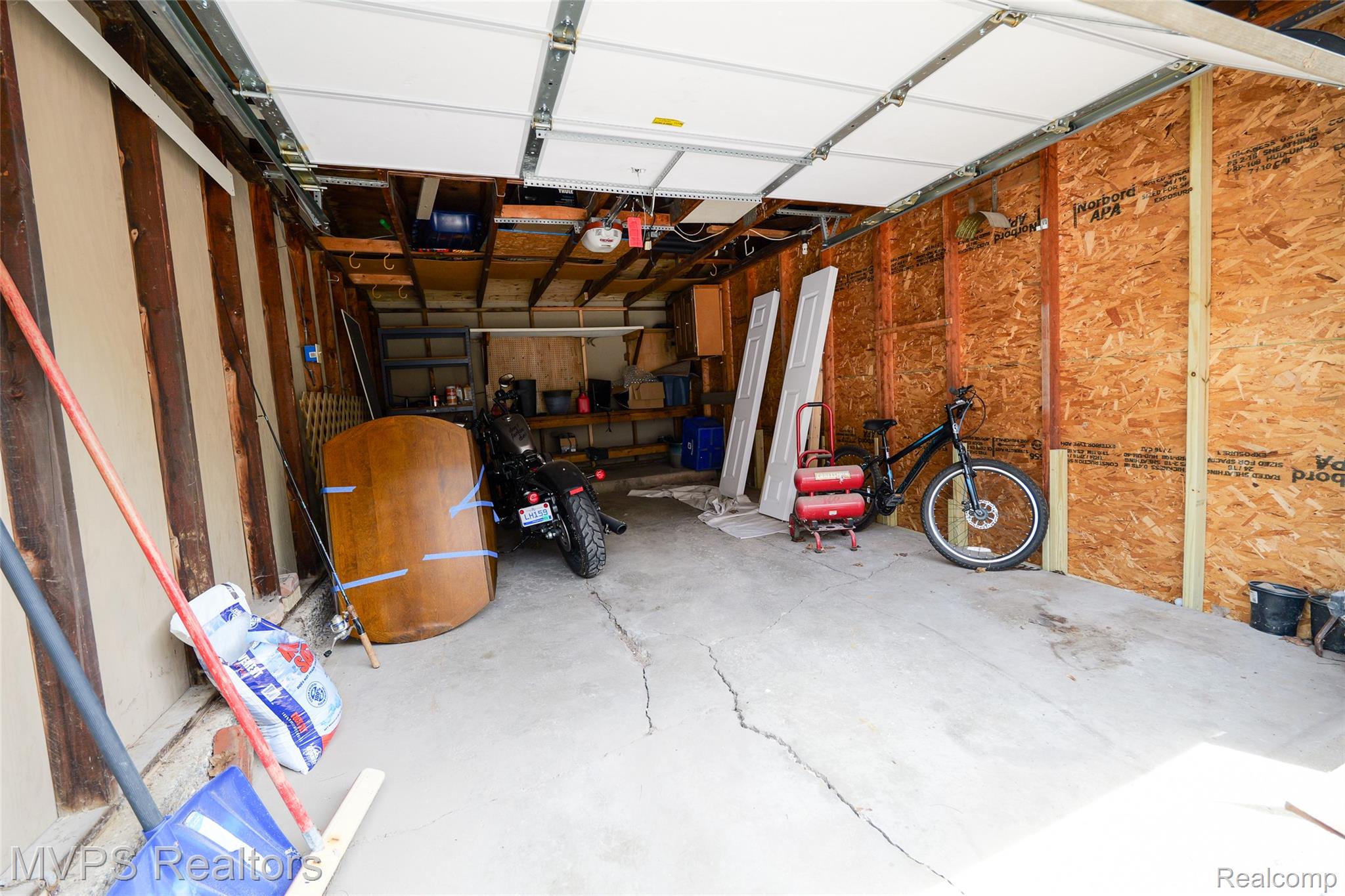 804 Oak Brook Ridge Drive, Unit 149 Rochester, MI 48307 - Photo 42 of 49 View of garage