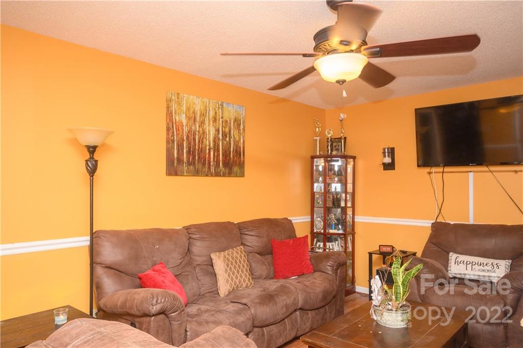 696 Forest Road Rock Hill, SC 29730 - Photo 2 of 15 a living room with furniture and a flat screen tv