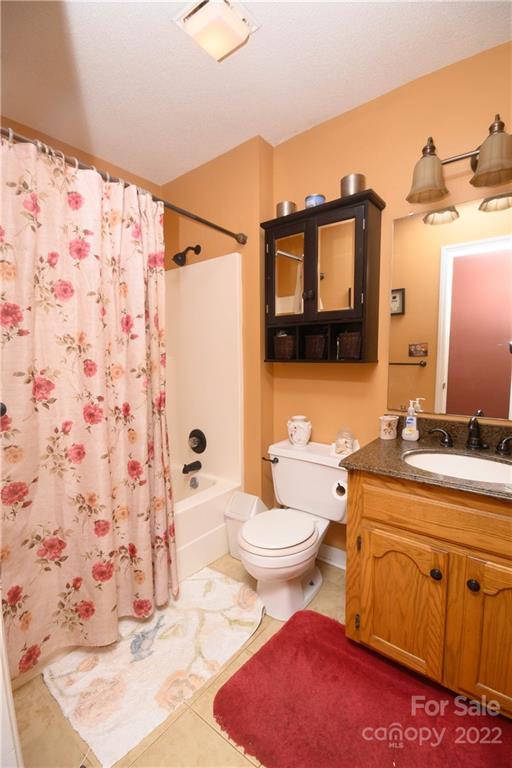 696 Forest Road Rock Hill, SC 29730 - Photo 4 of 15 a bathroom with a sink toilet vanity and shower