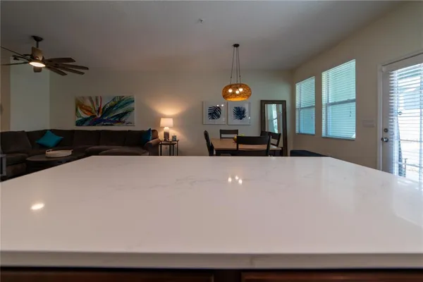 a living room with furniture and a table