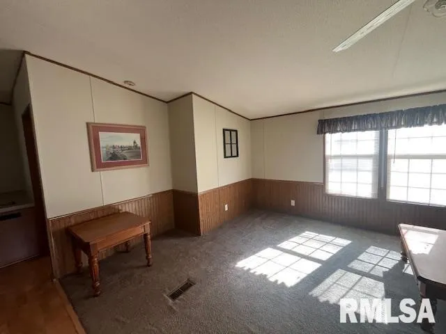 a bathroom with a toilet and a sink