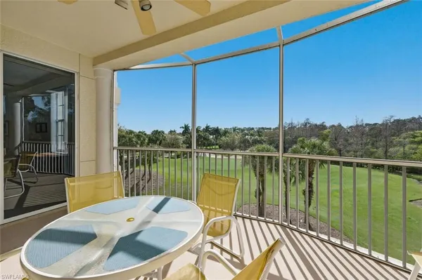 a view of a lake from a balcony