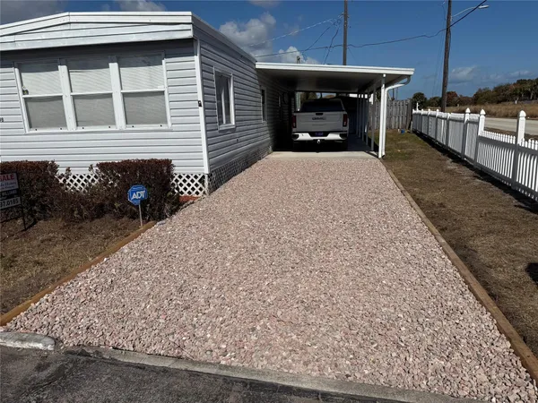 a view of a house with a patio
