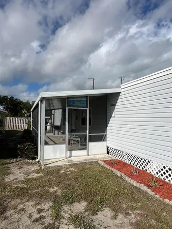a view of a house with a porch