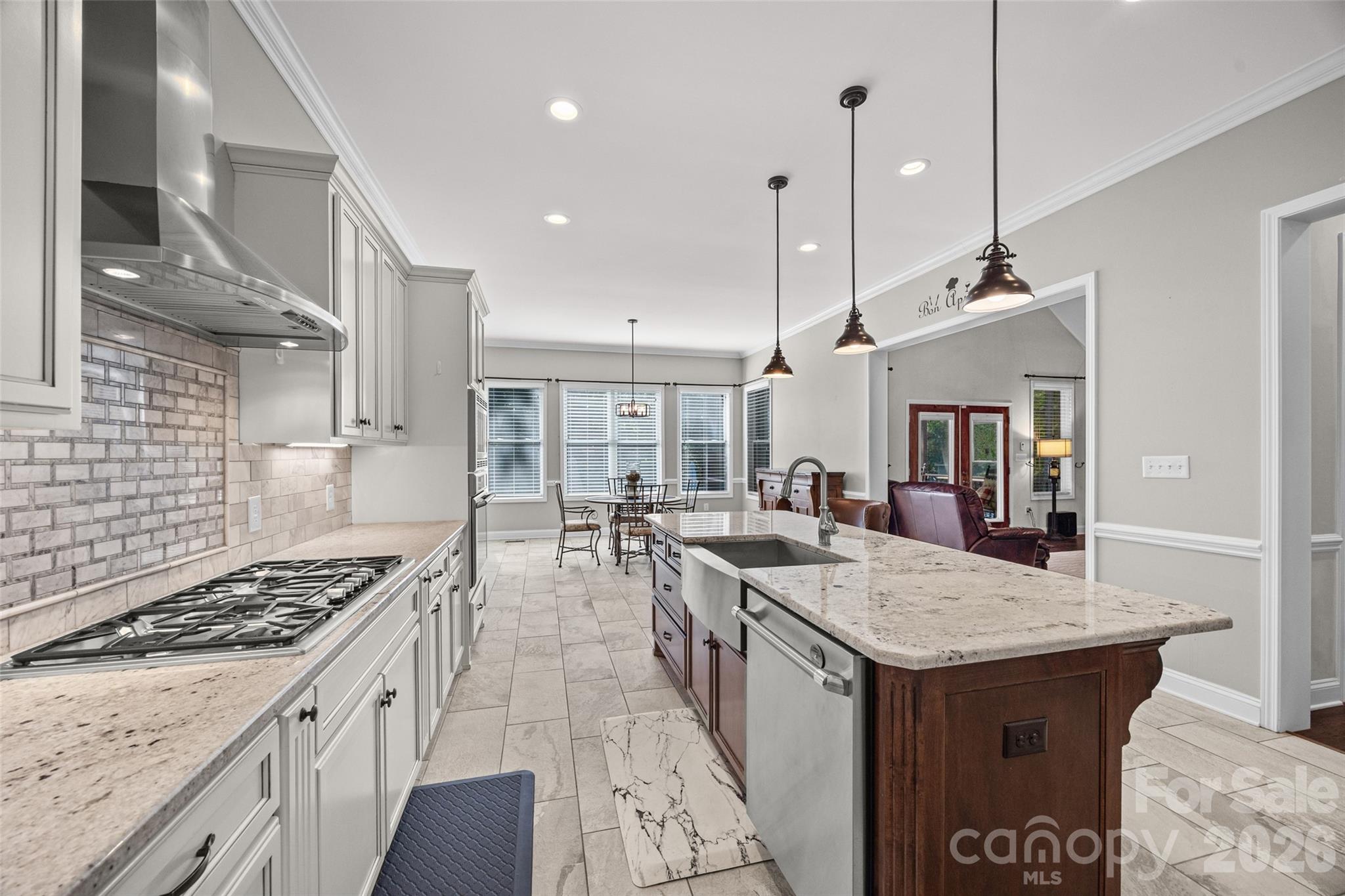 790 Brandon Road Clover, SC 29710 - Photo 21 of 43 a kitchen with sink stove and chairs