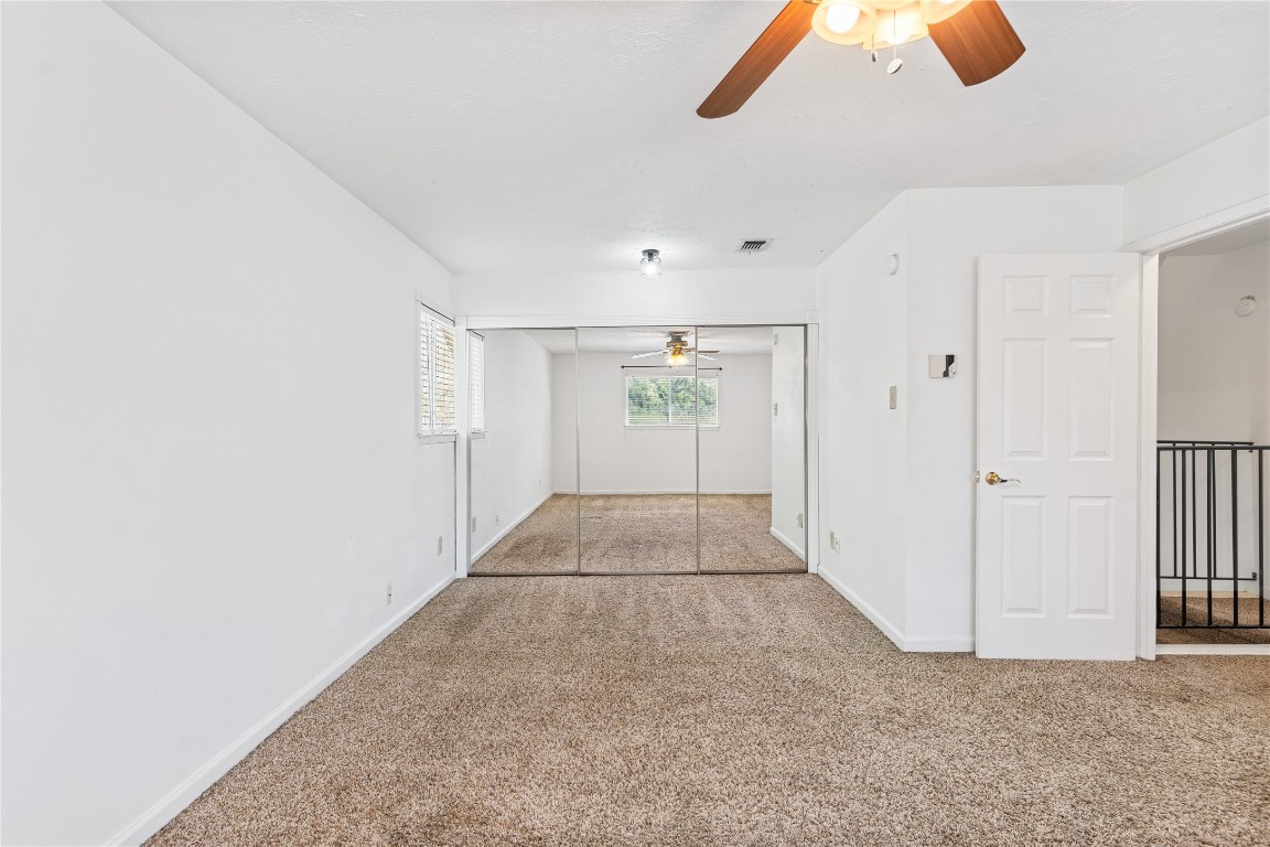 7019 Sandy Knolls Drive Spring, TX 77379 - Photo 15 of 25 Another spacious bedroom upstairs with an ensuite bathroom