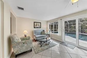 a living room with furniture and a window