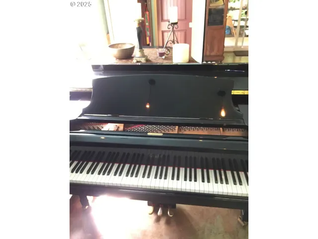 a room with lots of windows and chairs