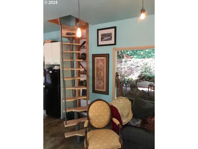 a bedroom with bed and a closet