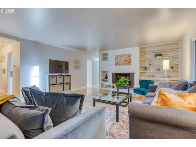 a kitchen with stainless steel appliances sink refrigerator and cabinets