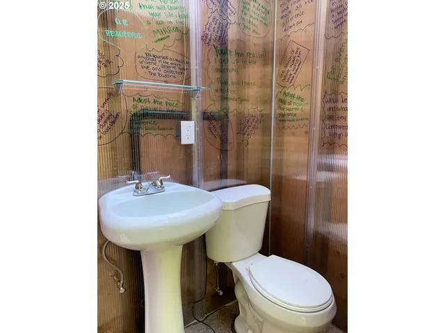 a view of a balcony with trees