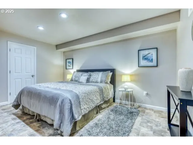 a bathroom with a sink vanity and a mirror