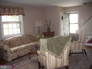 609 Covington Road Havertown, PA 19083 - Photo 2 of 6 a living room with furniture and a window