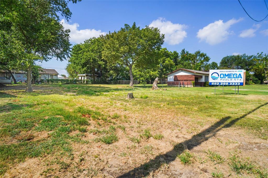 313 West Highway 199 Springtown, TX 76082 - Photo 3 of 4 a view of a big yard with swimming pool and green space