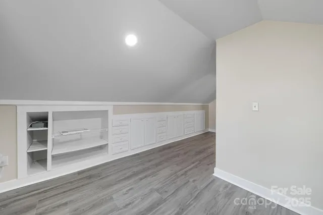 a view of an empty walk in closet