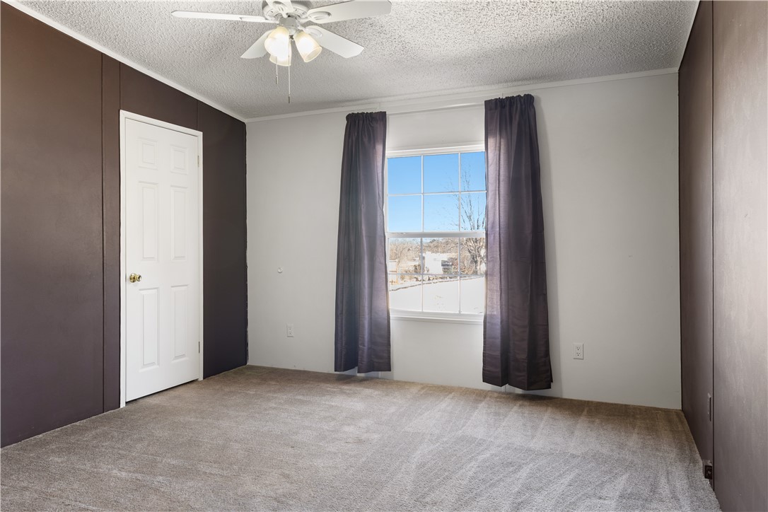811 Pine Grove Road Seneca, SC 29678 - Photo 11 of 20 This inviting bedroom provides a comfortable retreat with ample natural light.