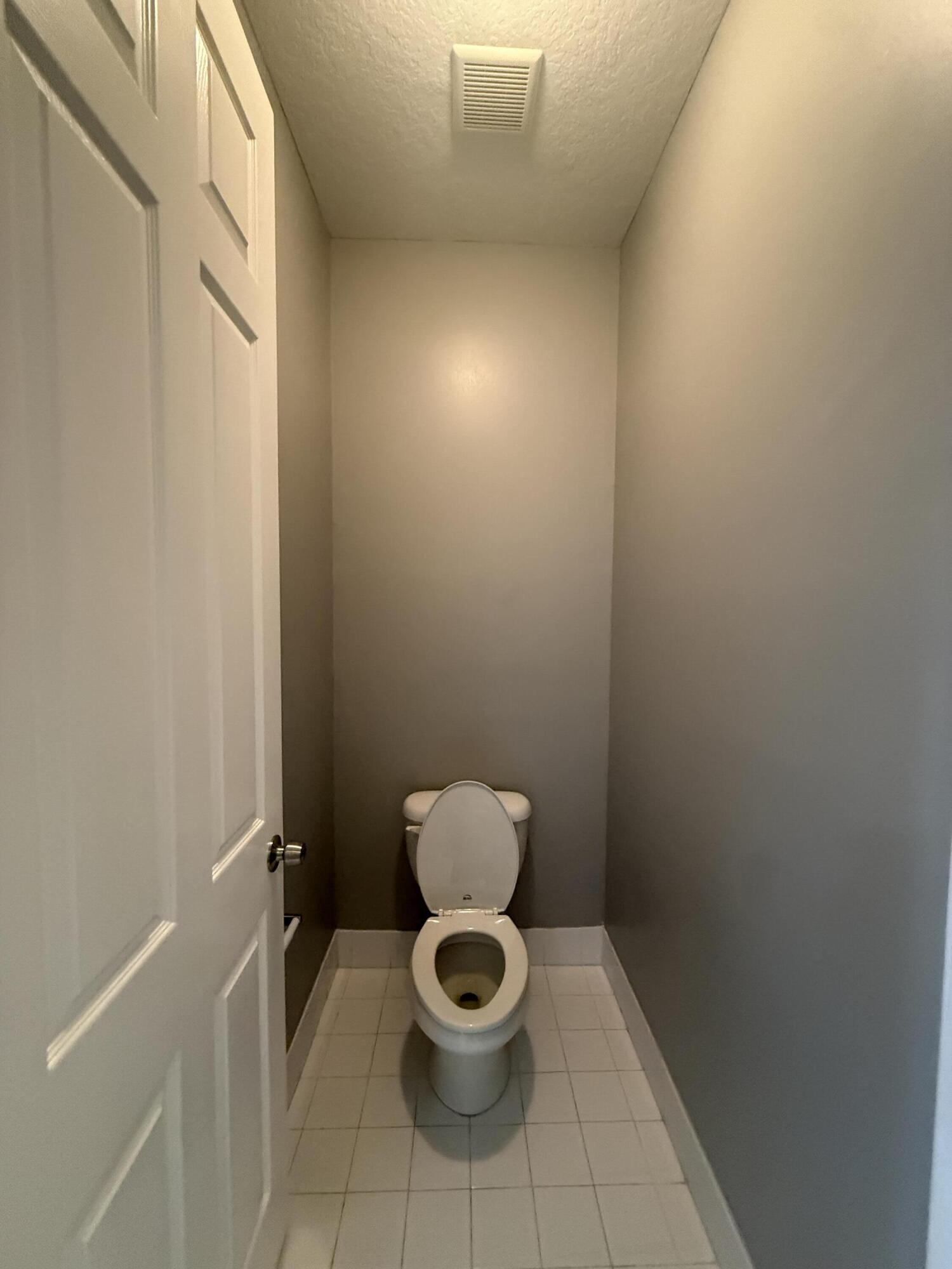 2851 Prospect Road, Unit 502 Tamarac, FL 33309 - Photo 12 of 17 a bathroom with a toilet