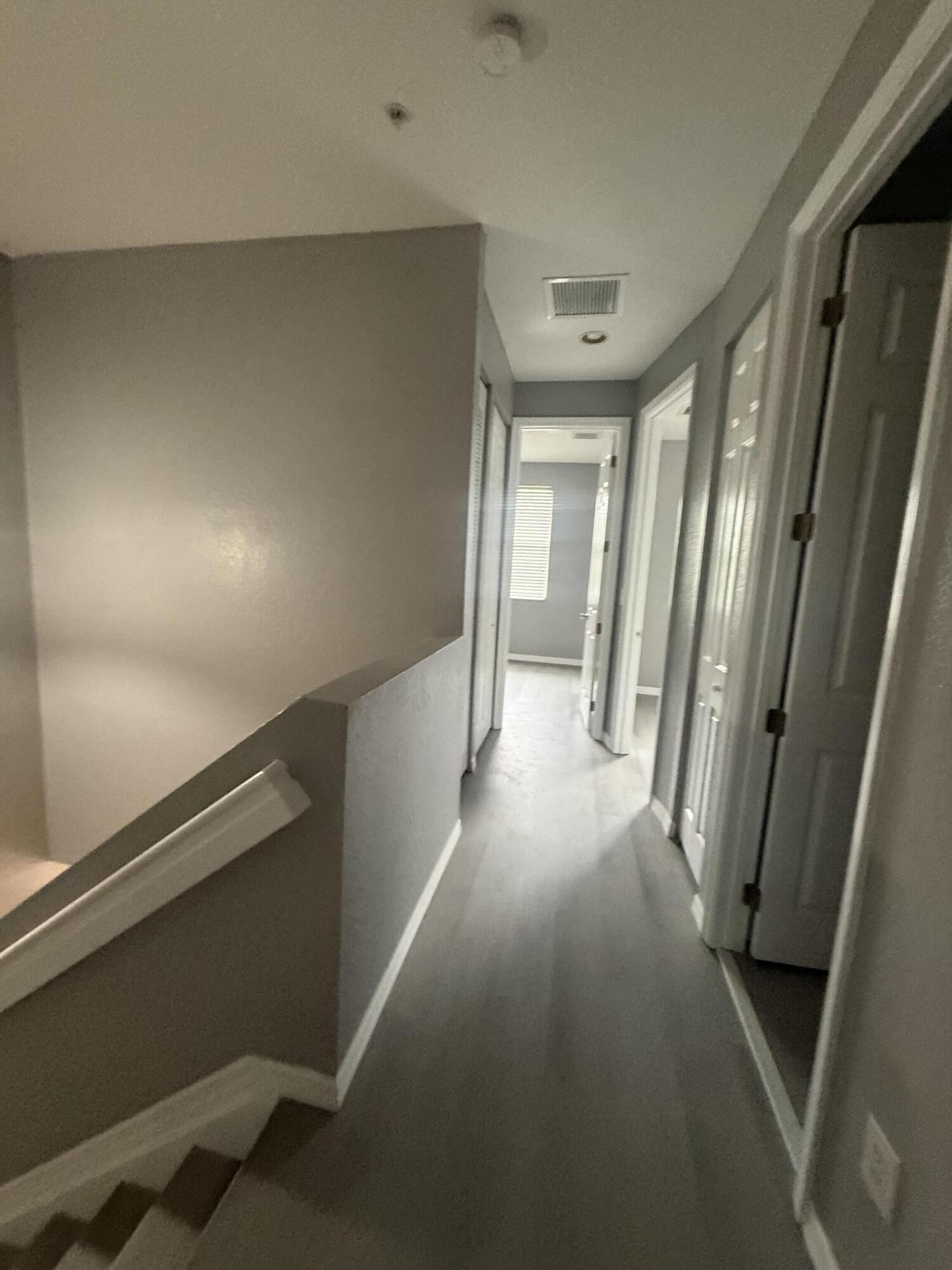 2851 Prospect Road, Unit 502 Tamarac, FL 33309 - Photo 13 of 17 a view of a hallway