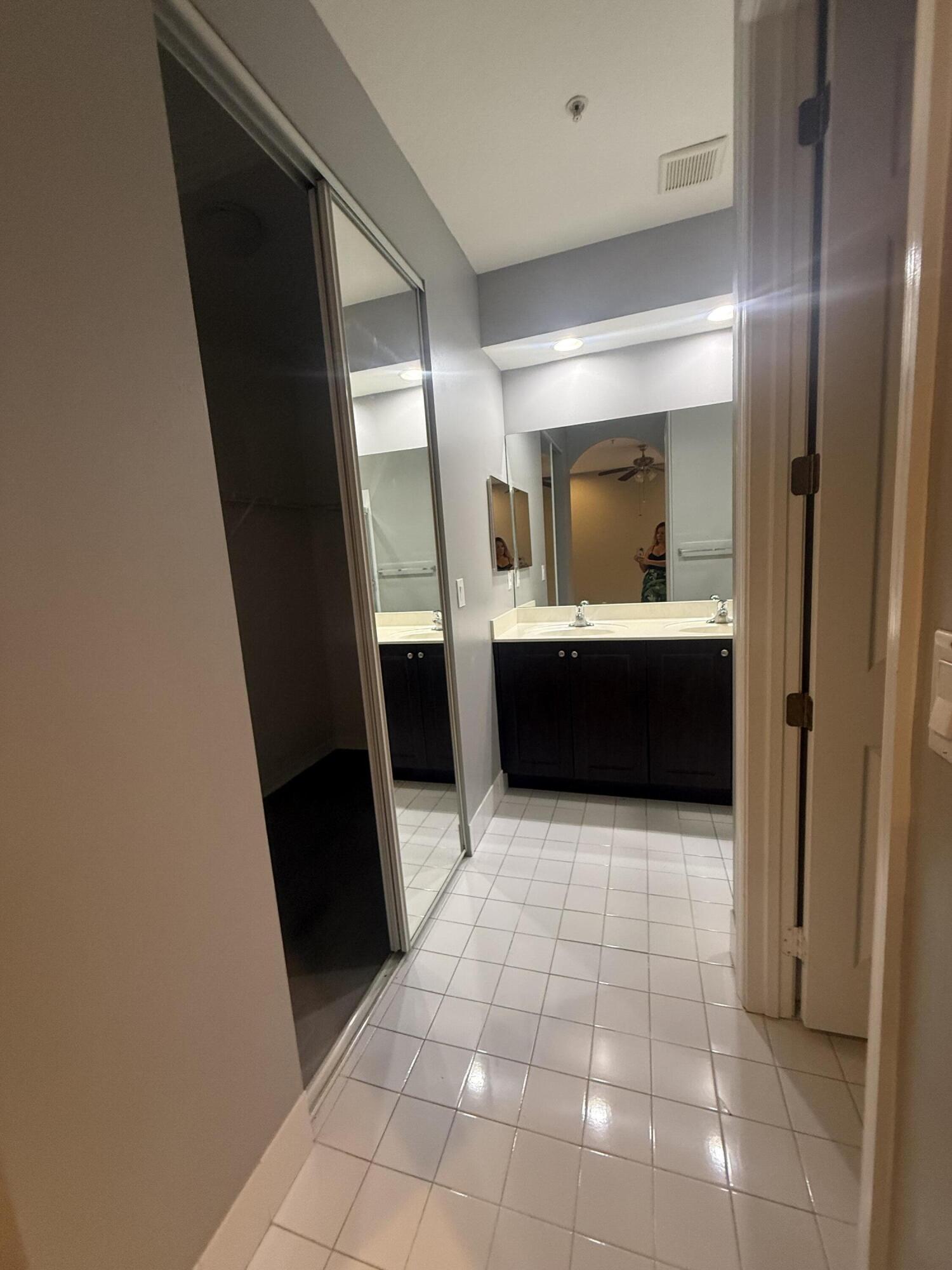 2851 Prospect Road, Unit 502 Tamarac, FL 33309 - Photo 14 of 17 a view of hallway with washer and dryer