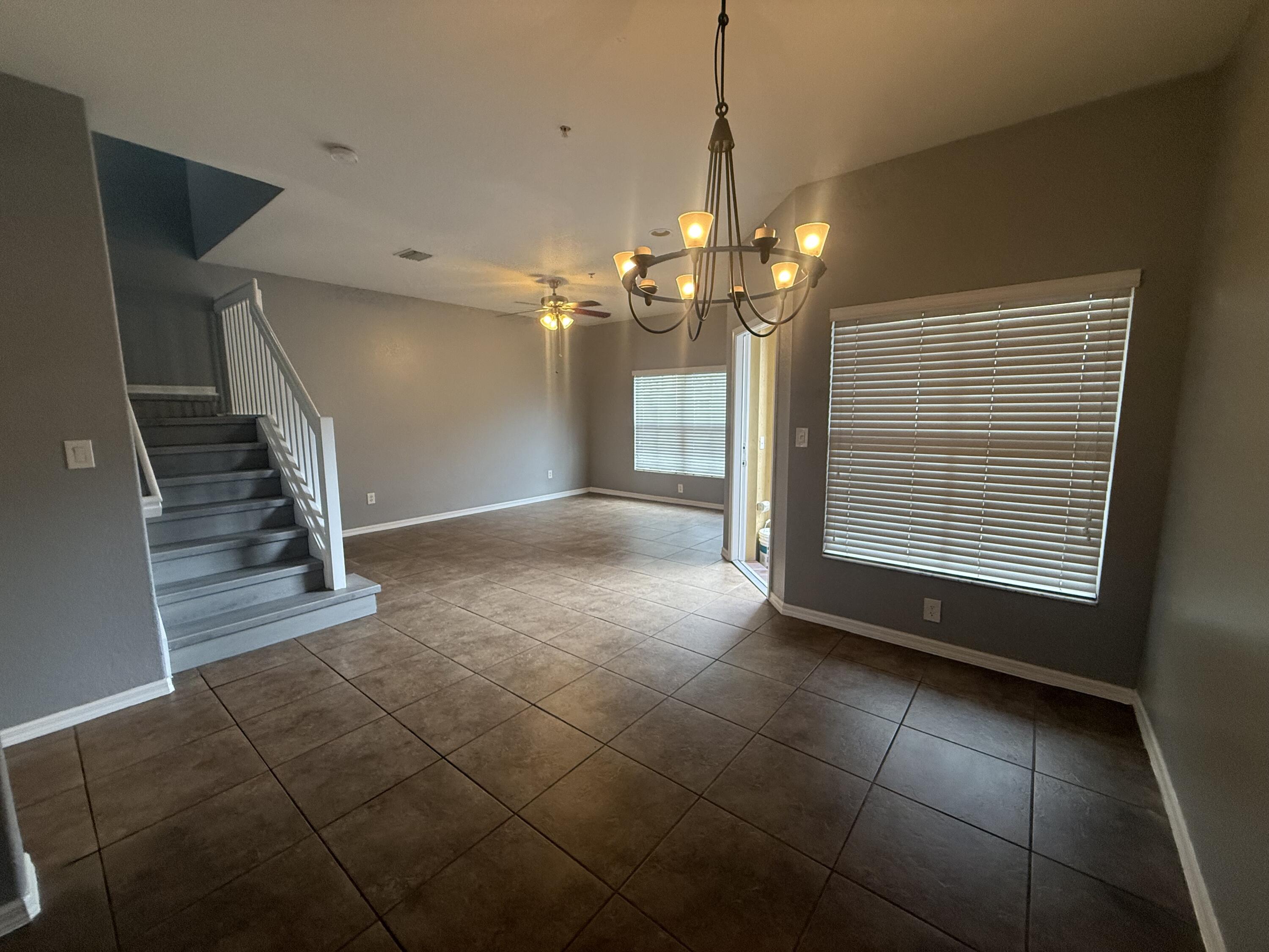 2851 Prospect Road, Unit 502 Tamarac, FL 33309 - Photo 15 of 17 a view of an empty room with stairs