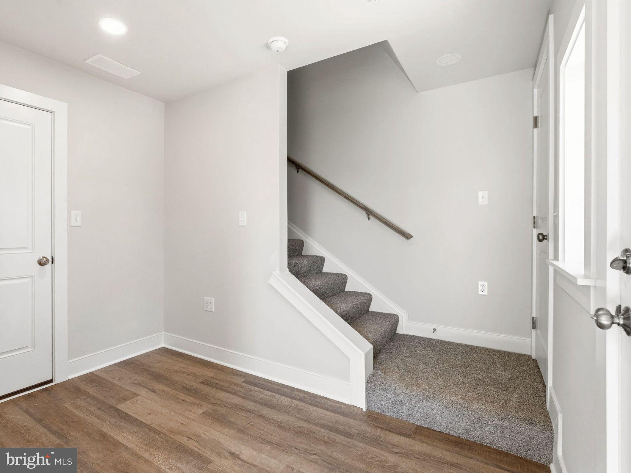 23 Snap Dragon Road Carlisle, PA 17015 - Photo 5 of 36 a view of entryway and hall with wooden floor