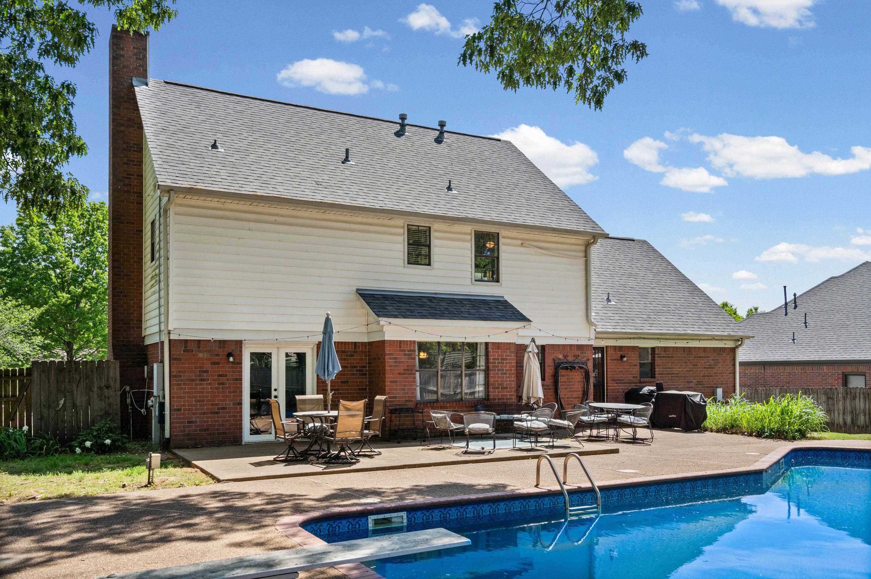 897 Wood Cove Collierville, TN 38017 - Photo 24 of 30 a view of a building with sitting area and furniture