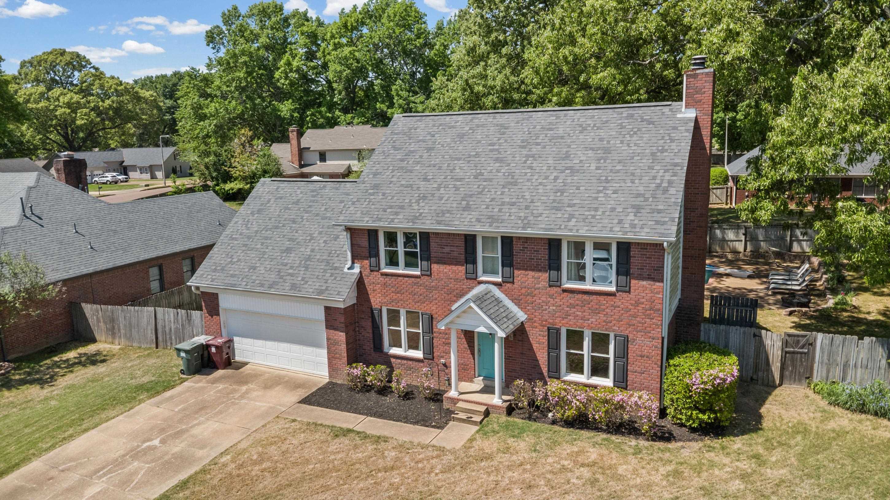 897 Wood Cove Collierville, TN 38017 - Photo 26 of 30 an aerial view of a house with a yard