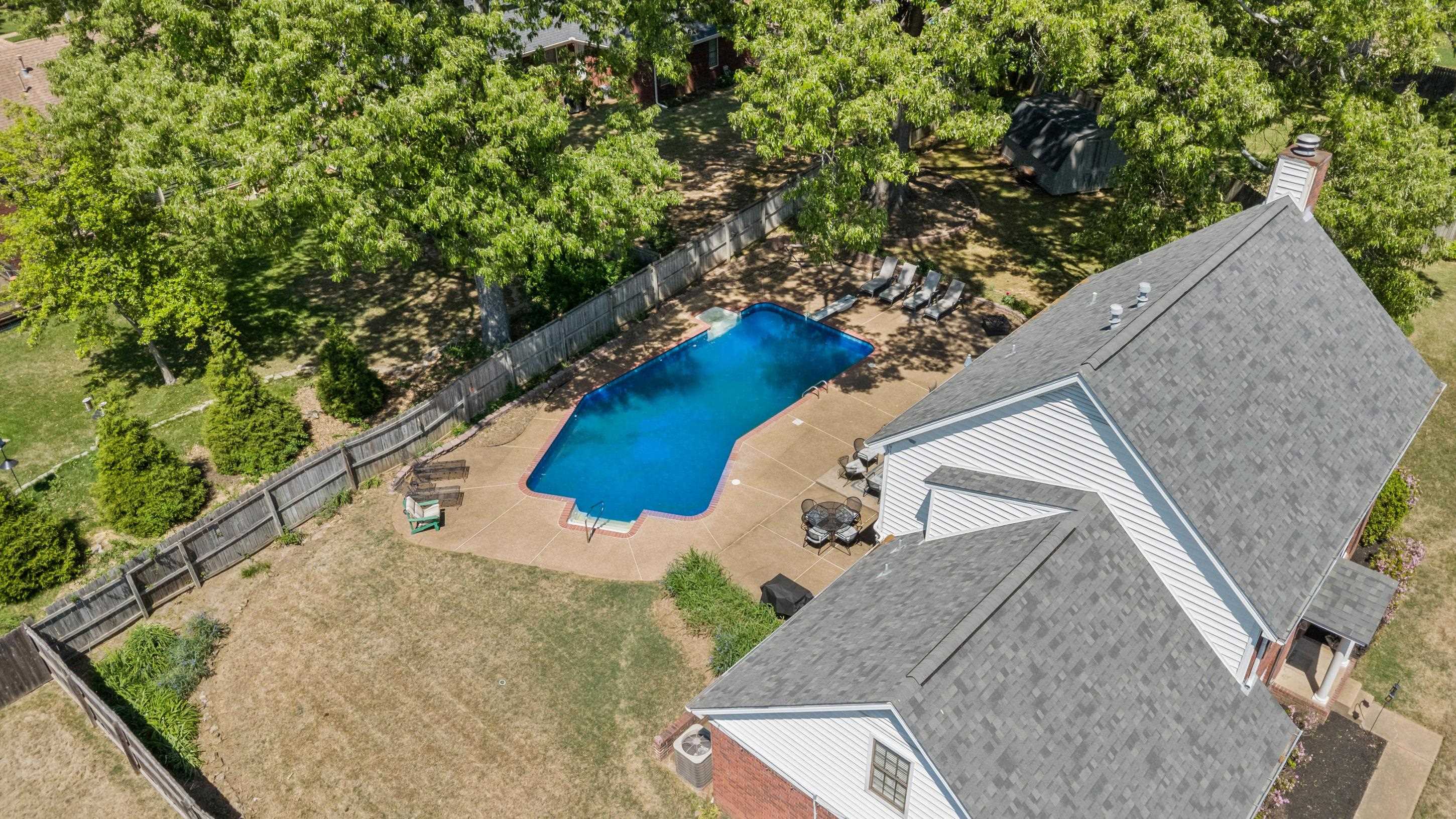 897 Wood Cove Collierville, TN 38017 - Photo 29 of 30 a view of a house with a backyard